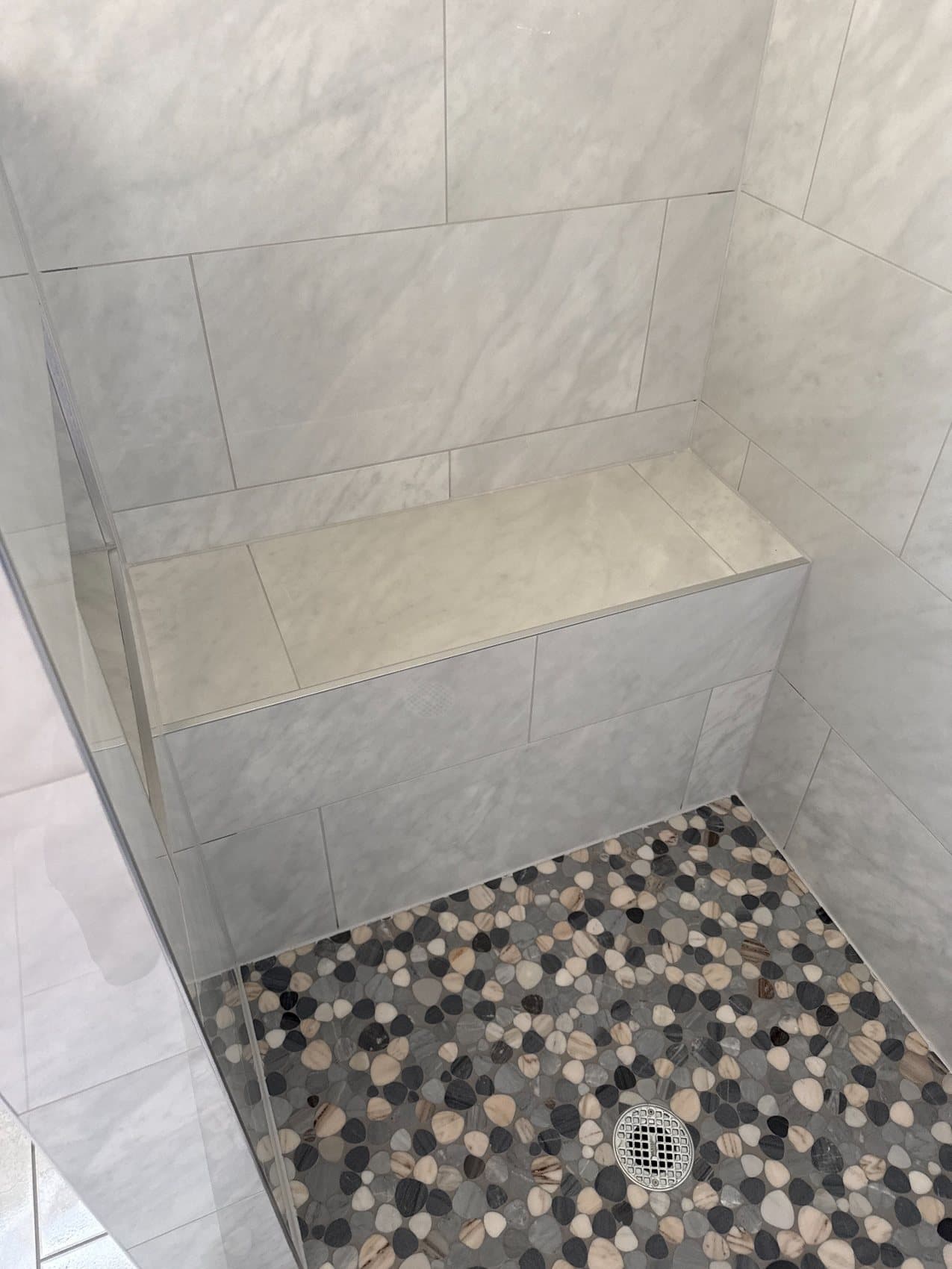 Shower Bench · Pebble Mosaic Floor